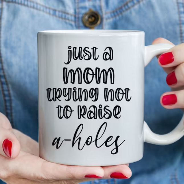 Just A Mum Trying To Raise A**H**es - Funny Novelty Mug